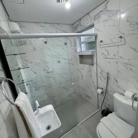 Suites Delphin Pe Na Areia Guarujá Quarto foto