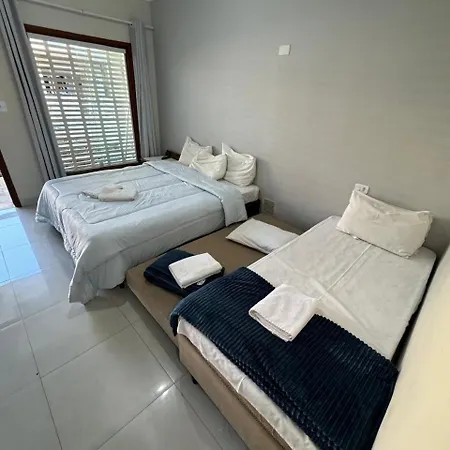 Suites Delphin Pe Na Areia Guarujá Quarto foto
