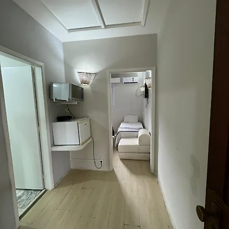 Suites Delphin Pe Na Areia Guarujá Quarto foto
