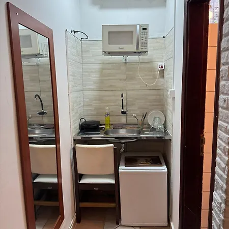 Suites Delphin Pe Na Areia Guarujá Quarto foto