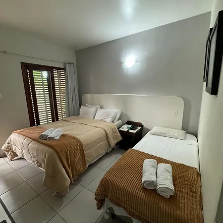 Suites Delphin Pe Na Areia Guarujá Quarto foto