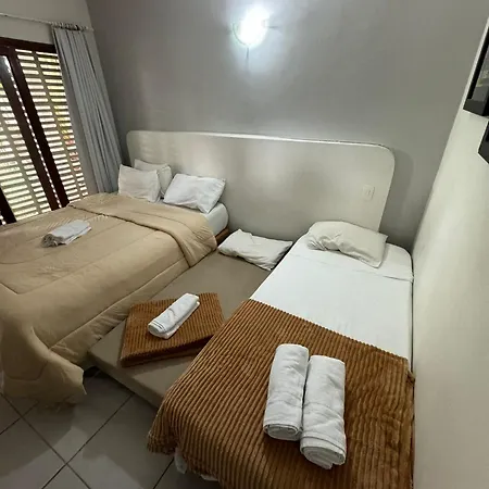 Suites Delphin Pe Na Areia Guarujá Quarto foto