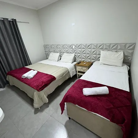Suites Delphin Pe Na Areia Guarujá Quarto foto