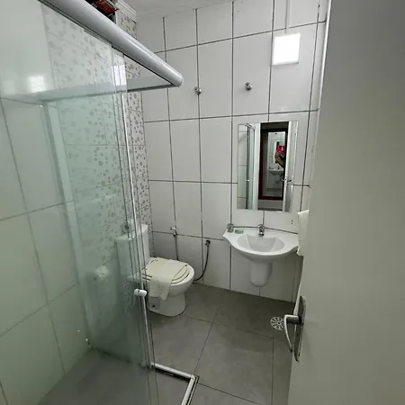 Suites Delphin Pe Na Areia Guarujá Quarto foto