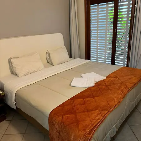 Suites Delphin Pe Na Areia Guarujá Quarto foto
